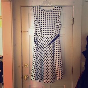 Polka dotted dress with belt